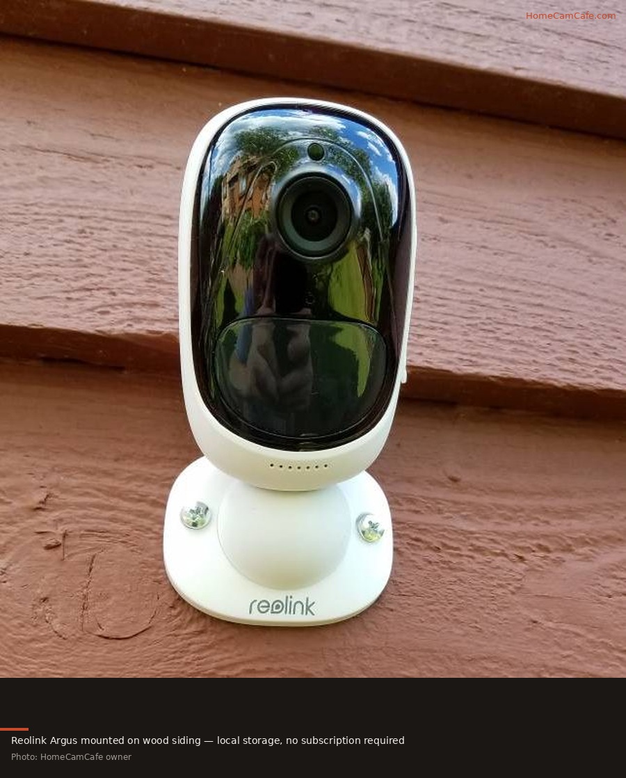 Reolink Argus mounted on wood siding — HomeCamCafe owner photo
